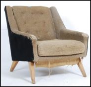 A stunning retro / vintage mid century G Plan two tone wing back armchair with button back seat