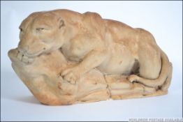 A good 20th century large carved stone tiger raised on plinth base having inscribed signature to