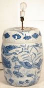 A large 20th century Chinese blue and white ceramic table lamp of oversized form.