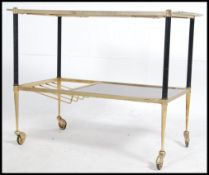 A stunning 1930's ? brass and rosewood serving trolley, with stunning angular lines,