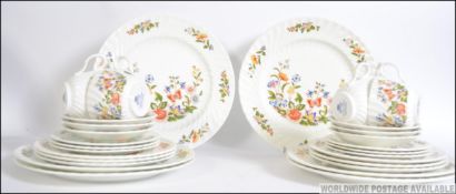 A chintz bone China Staffordshire tea service by Aynsley consisting of six cups, six saucers,