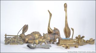 A collection of vintage 20th century brass wares to include horse brasses,