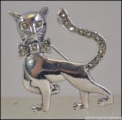 A ladies 20th century silver and marcasite brooch in the form of a cat. Measures 4cms / Weight 7.