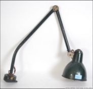A good mid century Industrial French anglepoise factory work / desk lamp having wall bracket