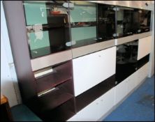 A 1970's Modular Hulsta retro modular upright 4 section cabinet system with smoked glass,