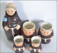 A Goebel - West German ceramic drinks decanter in the form of a Monk together with a set of 4