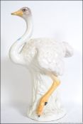 A vintage retro 20th century kitsch Staffordshire type Ostrich / Emu ceramic stick stand - planter