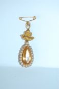 An 18ct gold Edwardian pendant brooch pin set with central teardrop citrine, approx 3cts,