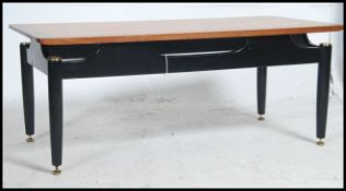 A Retro mid 20th century G-Plan Librenza coffee - occasional table raised on ebonised legs with