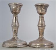 2 silver hallmarked stub candlesticks with ribbed decoration,