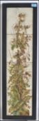 A framed run of 4 Aesthetic movement Minton tiles decorated with thistles set to an ebonised frame.