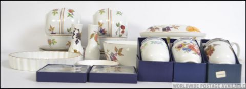 A collection of Royal Worcester Evesham ceramic ware items together with Worcester boxed items.