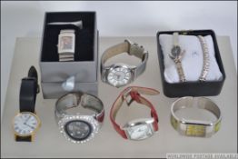 A group of contemporary ladies and gents watches to include PM, Mortima, Cuzzi etc.