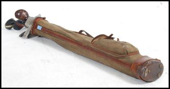 A collection of vintage golf clubs to include Mashie Niblick, Lane Crawford, Forgan, Harrods,