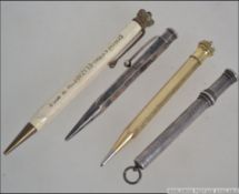 A collection of propelling pens - pencils to include a sterling silver Yard-O-Led,