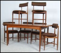A set of 6 1970's Kofod Larsen G-Plan dining rooms suite comprising extending dining table together