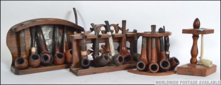 A collection of vintage smoking pipes to include Bruyere, Briar, Comet, Falcon,