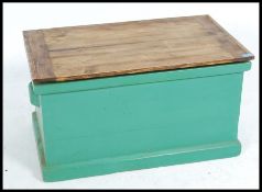 A Victorian painted pine blanket box in green.