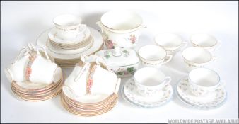 A Royal Worcester part dinner / tea service ' Forget Me Not ' to include trio's,