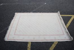 2 20th large Chinese rugs with deep pile having decorative central panels and tassled ends.