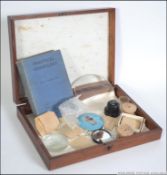 An early 20th century mahogany case belonging to a Gemologist to include book, Abben.A.1.