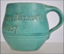 A Baron Barnstaple commemorative mug celebrating the coronation of King George VI and queen