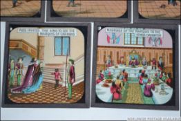 A complete set of eight glass coloured magic lantern slides for Puss In Boots from the Junior
