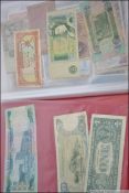 A collection of vintage early to mid 20th century paper money from all around the world.