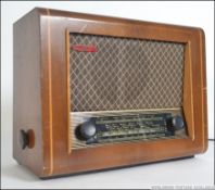 A vintage oak cased PYE valve radio. Model NO.