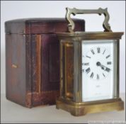 A late 19th century French made carriage clock with Selfridges London retailers mark of inverted