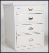 An early 20th century painted oak pedestal chest of drawers - bank of drawers of Industrial form