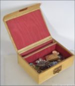 A collection of vintage costume jewellery to include brooches and pendants,