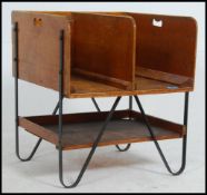 A vintage industrial Post Office sorting unit with two upper compartments with cut out carry