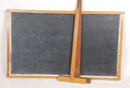 A mid century large blackboard of French origin having wooden painted surround together with 3