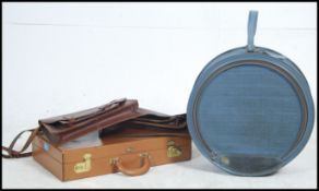 A retro round Atlantic suitcase together with 2 vintage leather satchels and a leather attache