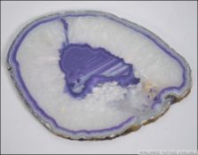 A polished cross section of agate hardstone.