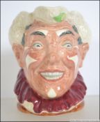 A Royal Doulton character jug 