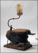 An upcycled 19th century bellows light - lamp.