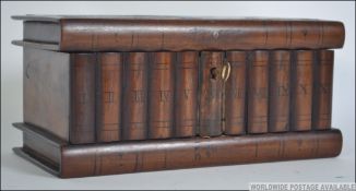 A 20th century Chinese puzzle box being constructed from fruit wood with a bamboo effect finish.