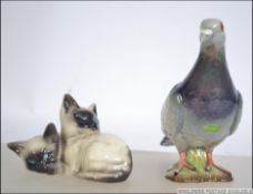 A fantastic vintage Beswick ceramic study of a grey pigeon with two bars to the wings impressed