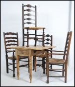 A set of 4 early 20th century oak ladderback and rattan weave country dining chairs together with a
