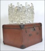A retro 1960's faux glass resin set chandelier together with a vintage leather hat box bearing