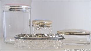 A silver hallmarked rouge pot - dressing table pot together with others to include an enamel top