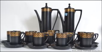 A 20th century retro coffee service by Portmeirion in the Greek key pattern.