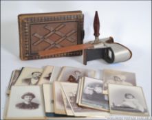 A vintage stereo card viewer along with a Victorian Carte de Viste album and 26 good cabinet cards
