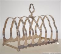 A silver hallmarked six section toast rack bearing assay marks for Birmingham.