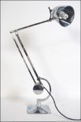 A contemporary 20th century Horstman style counter balance anglepoise desk lamp with a chrome