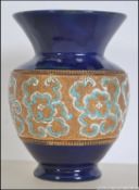 A Slaters Patent Doulton Lambeth stoneware vase in the Art Nouveau style Model No 6848 dating to