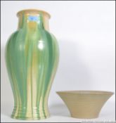 A vintage 20th century studio pottery salt drip glaze vase along with an early hand pained 20th