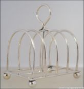 A silver hallmarked toast rack by William Hutton & Sons Ltd, Sheffield 1903. Weight 83.1g.